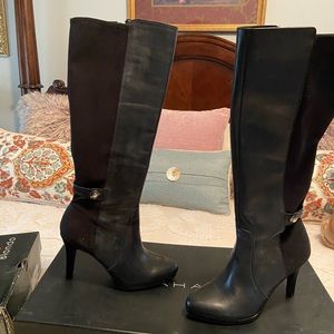 Black heeled Tahari boots. Worn once, excellent condition.
